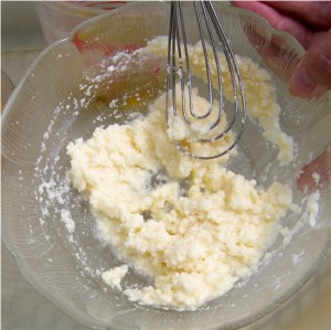 First, whisk the freshly-squeeze lemon juice into the grated Parmigiano.